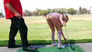 Karla Kush teasing her golf instructor with her short skirt